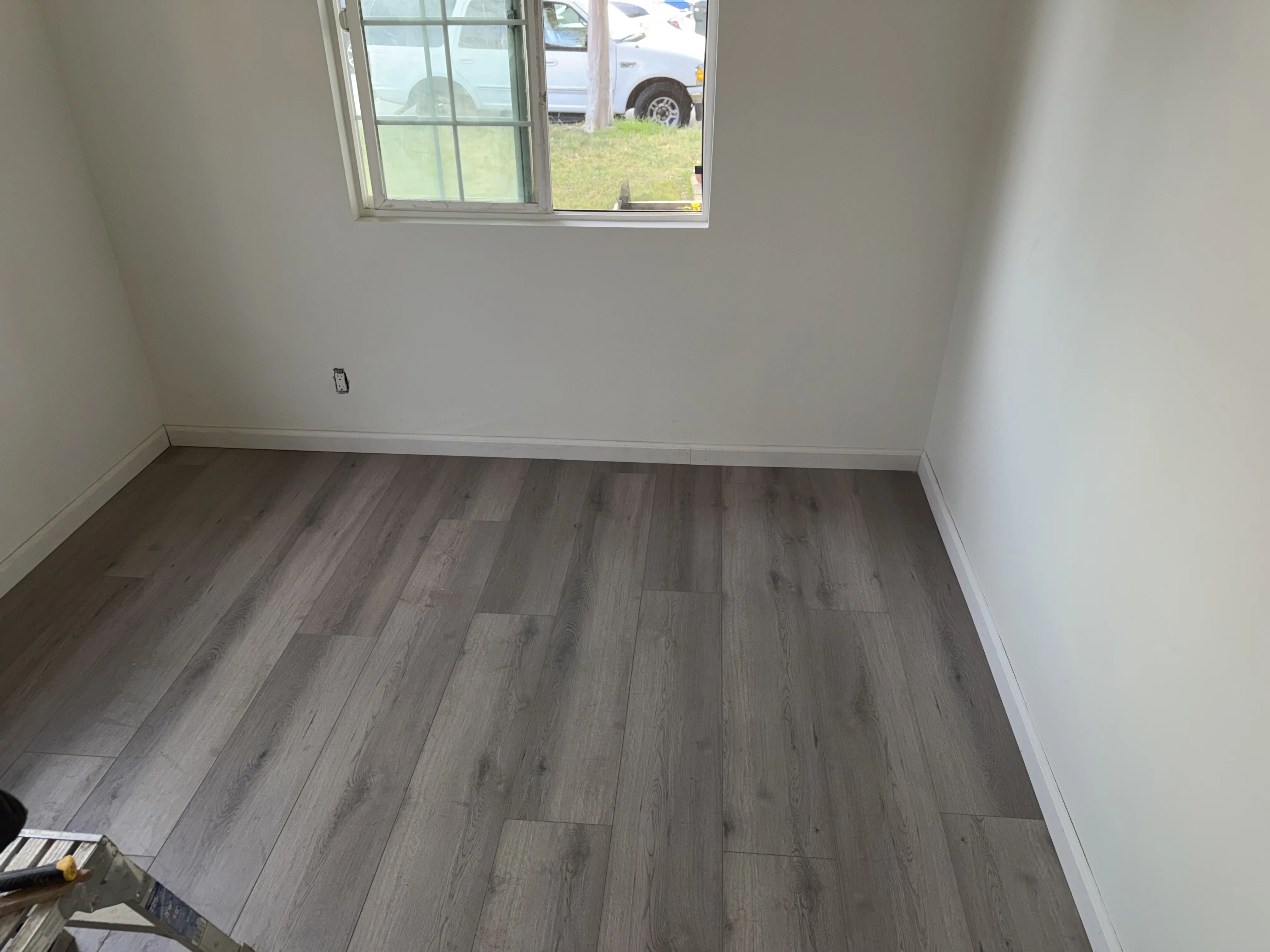 Renovated room with luxury vinyl flooring
