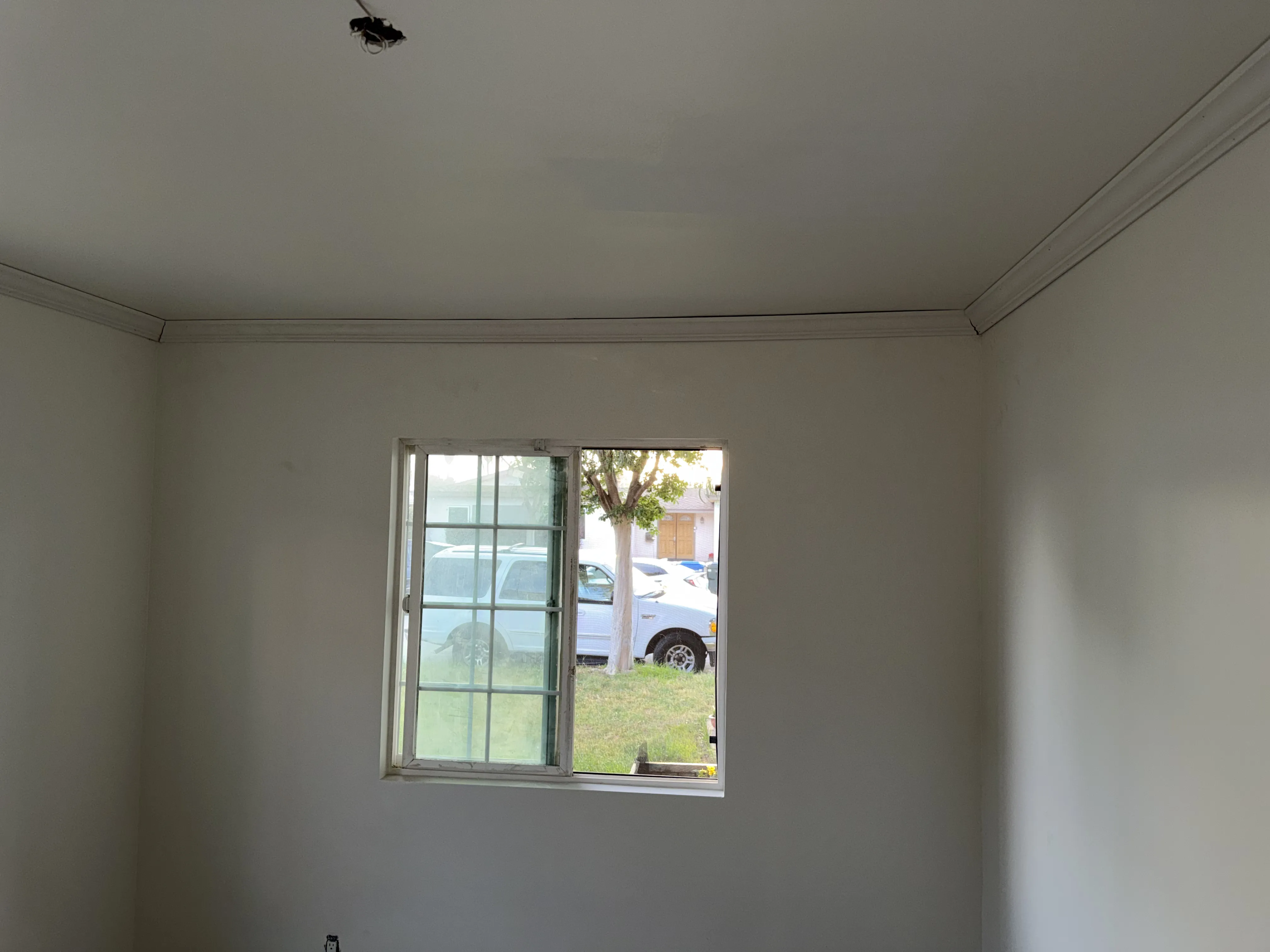 Room with closet and window